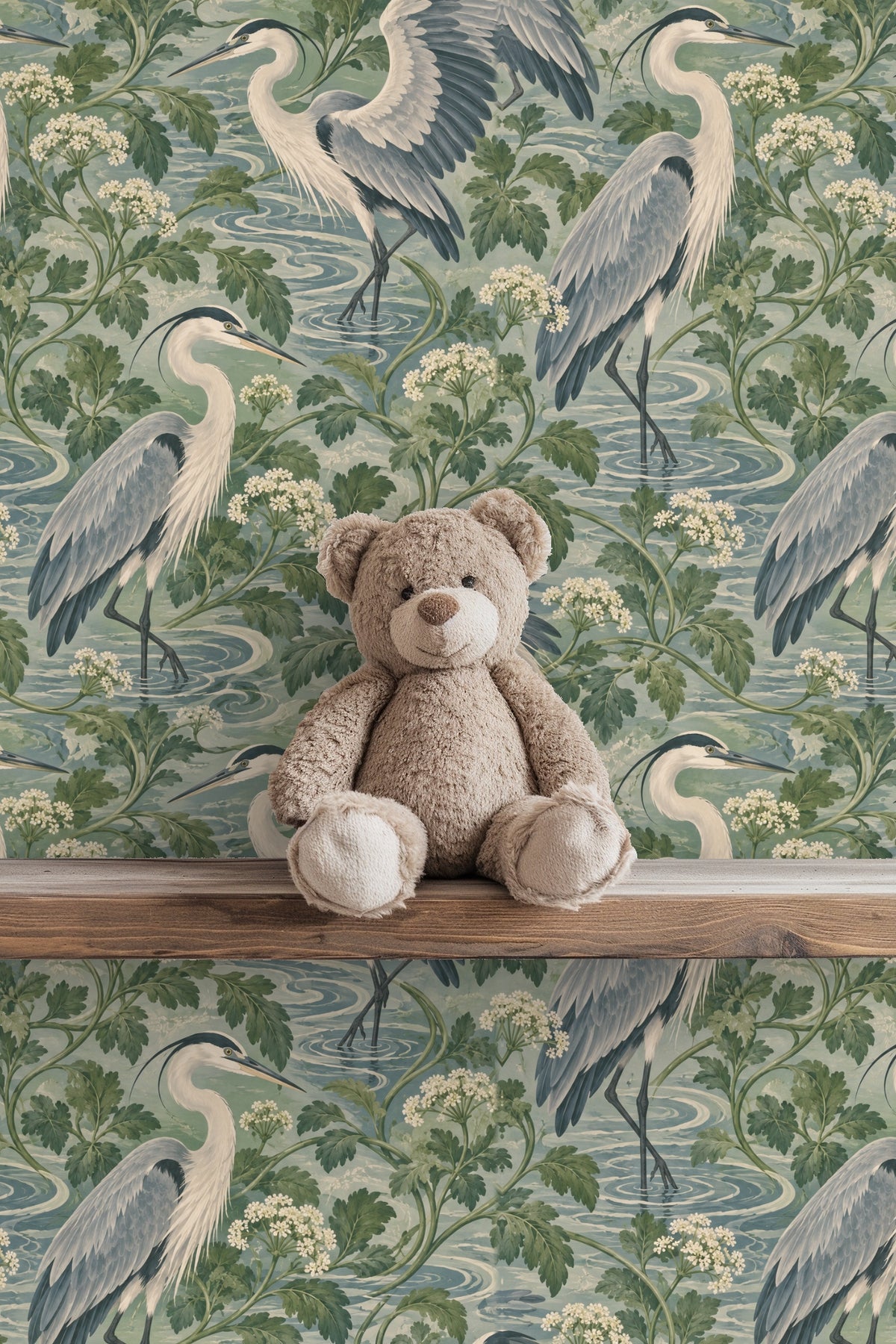 Soft blue and green palette of the wallpaper with intertwined botanical elements.