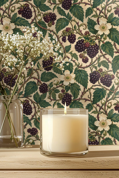 Close-up of Bramble Lantern Weave wallpaper showing detailed blackberries, white blossoms, green leaves, and twisting thorny vines.
