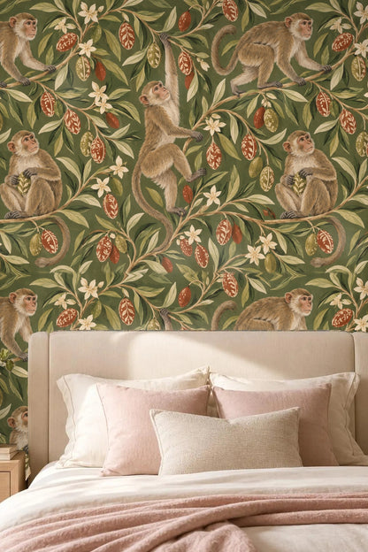 Living room with sofa and coffee table in front of wallpaper featuring playful macaques on olive foliage