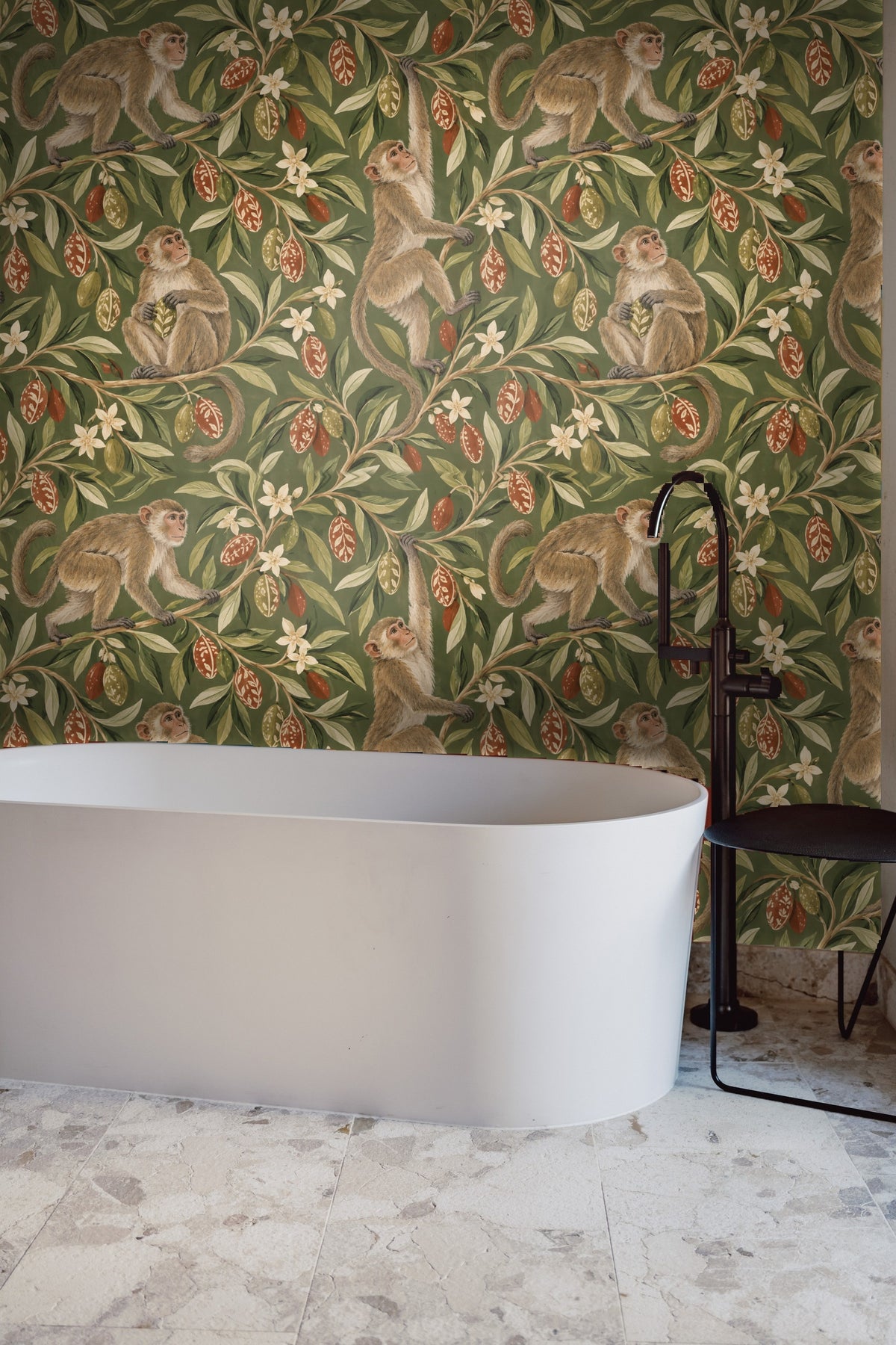 Partial view of wallpaper's intricate leaves and flower design
