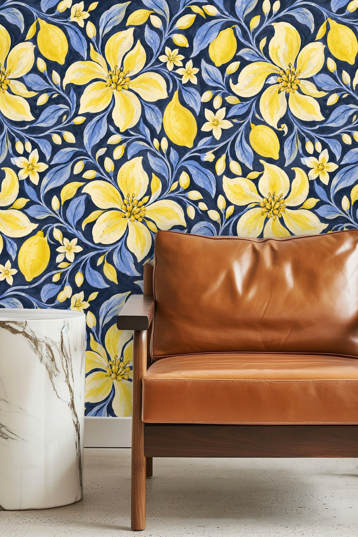 Wallpaper pattern with yellow lemons and blue leaves on navy background.