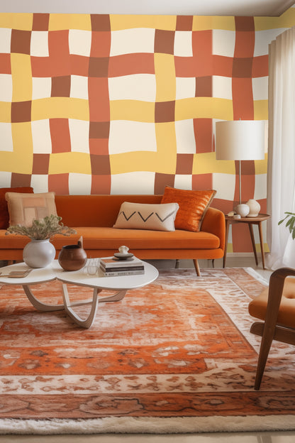 Wavy plaid ribbon check pattern in mustard, terracotta, and brown on cream background.