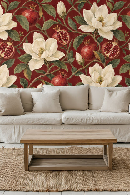 Living room with garnet magnolia knot wallpaper behind orange sofa and mid-century modern furnishings.