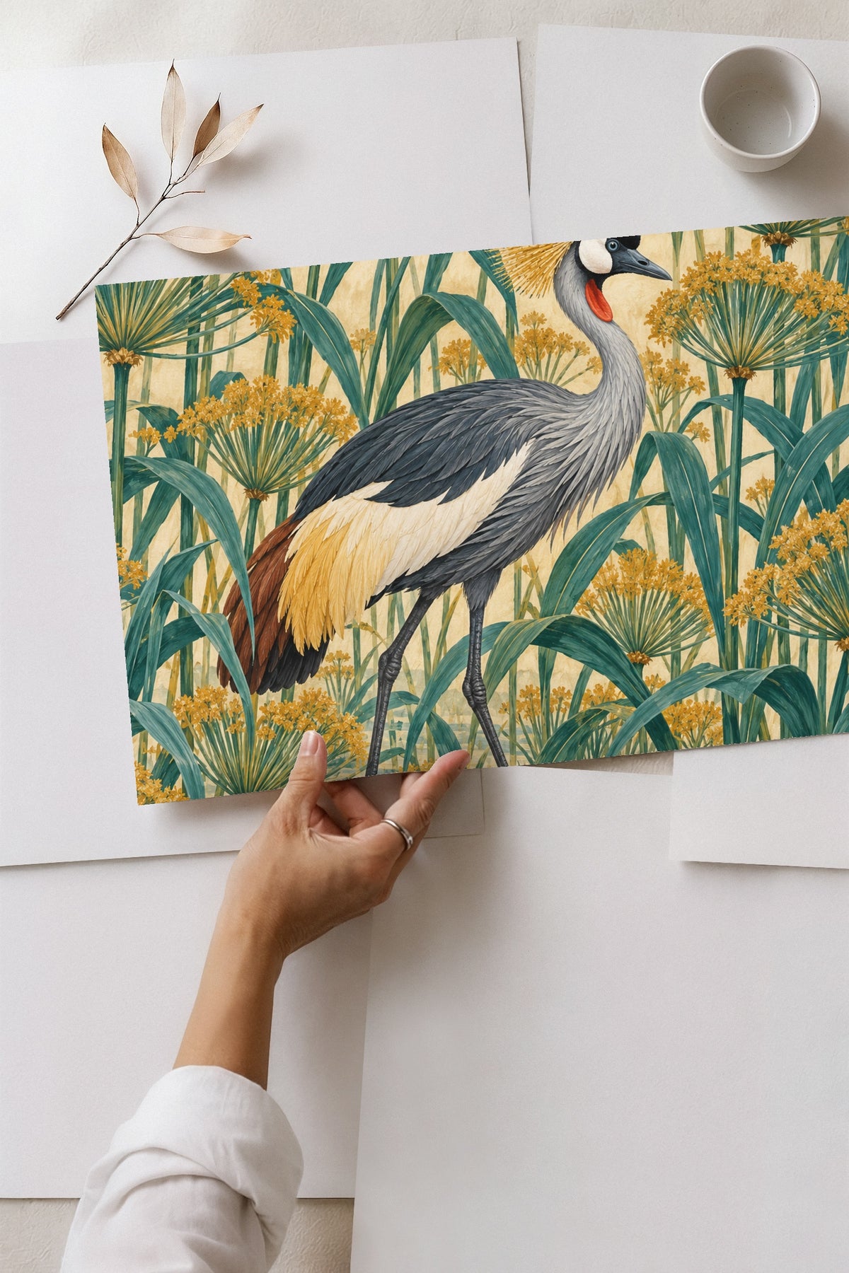 Illustration of crane’s long slender legs on textured ground with scattered papyrus shoots.