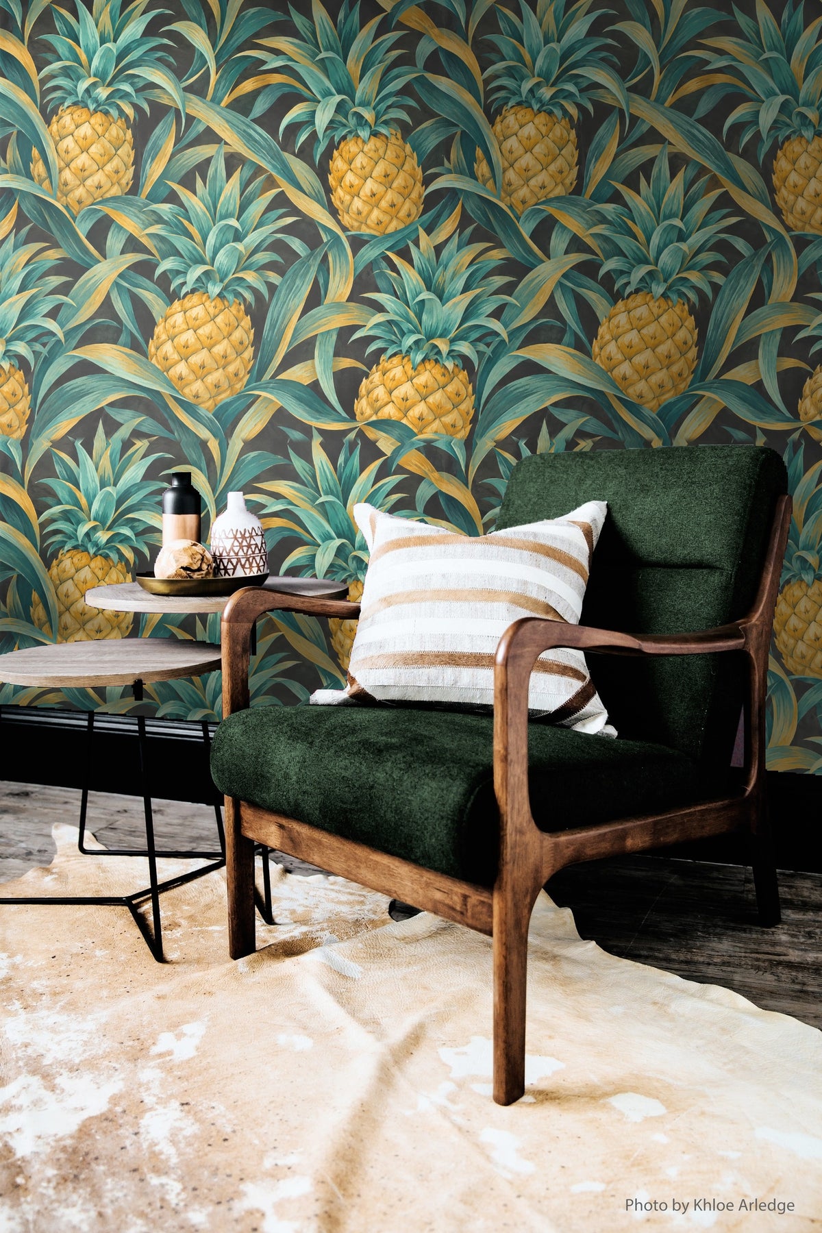 Segment showing color contrast between warm gold pineapples and cool teal leaves.