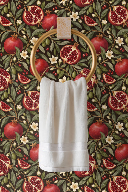 Mood wall image featuring Pomegranate Night pattern behind a wooden table with floral decor