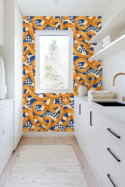 Blue and cream checkered backdrop with oversized salted pretzels