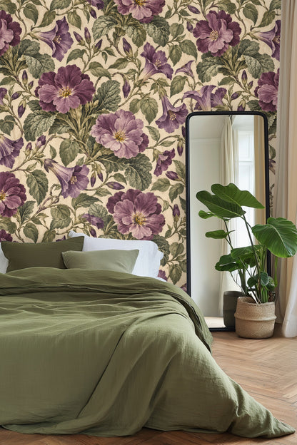 Bedroom featuring velvet streptocarpus wallpaper with large purple flowers, green bedding, and a full-length mirror