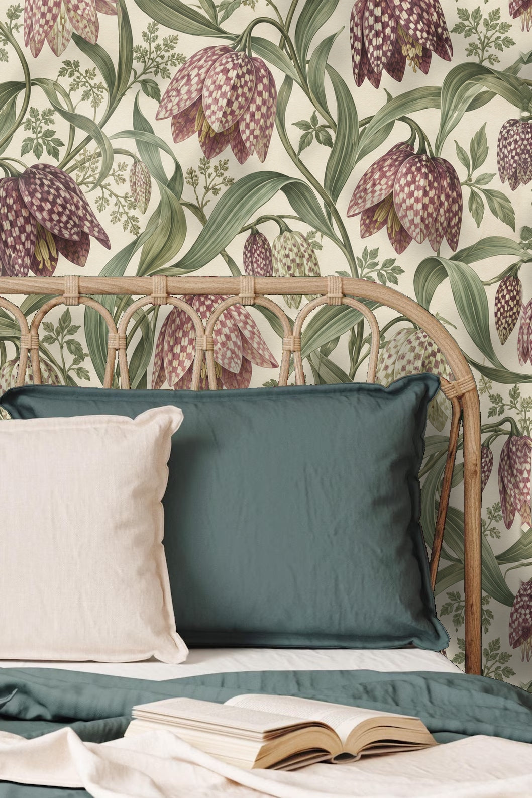 Playroom corner with floral wallpaper behind wicker chair and children's play table