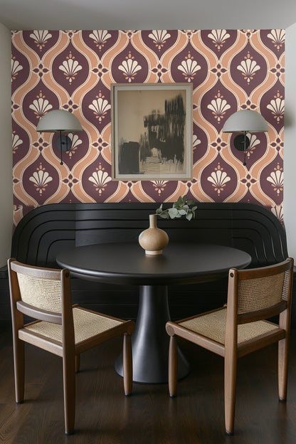 Washer and dryer beneath shelf on apricot lattice wallpapered wall