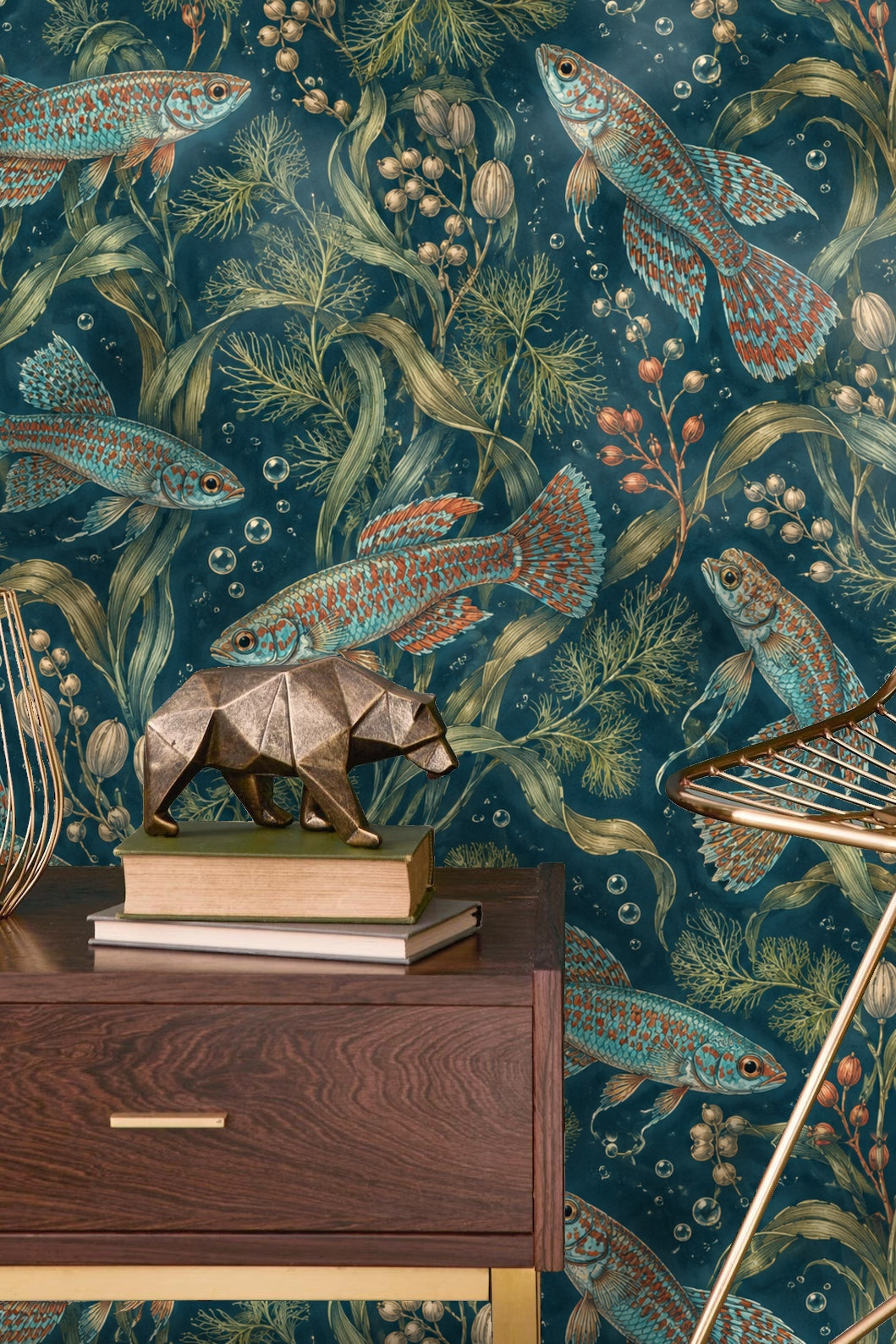 Bright killifish with patterned scales contrasted against dark blue background and pale seed pods.