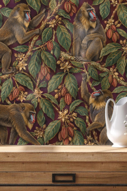 Decorative room vignette with wallpaper and bronze bear sculpture
