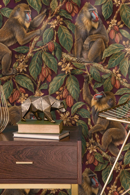 Wallpaper detail showing mandrills and cocoa pods on crimson background