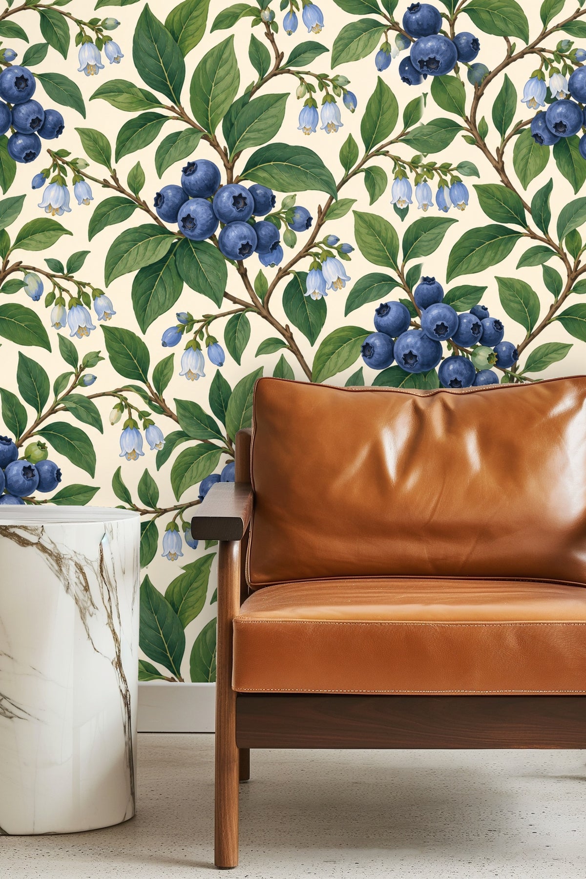 Wallpaper featuring clusters of deep blue blueberries with green leaves and white blossoms on cream background.