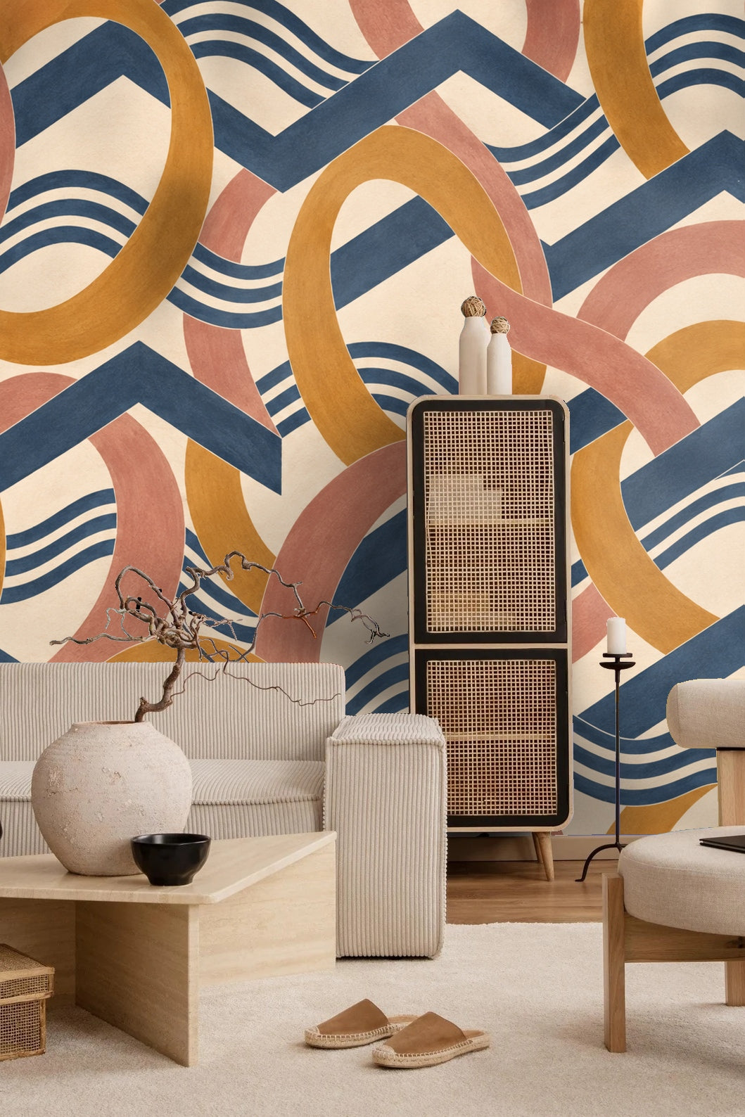 Curving dusty rose and amber arcs overlaid with cobalt chevrons in wallpaper