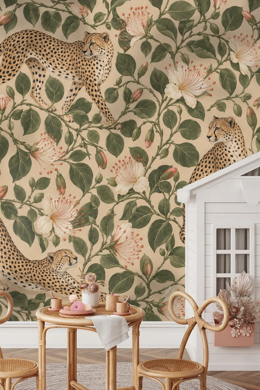 Living room corner with cheetah and botanical wallpaper behind a pale armchair and wooden cabinet