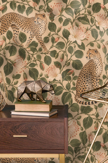 Close-up of cheetah figure with detailed spots and tail in botanical setting