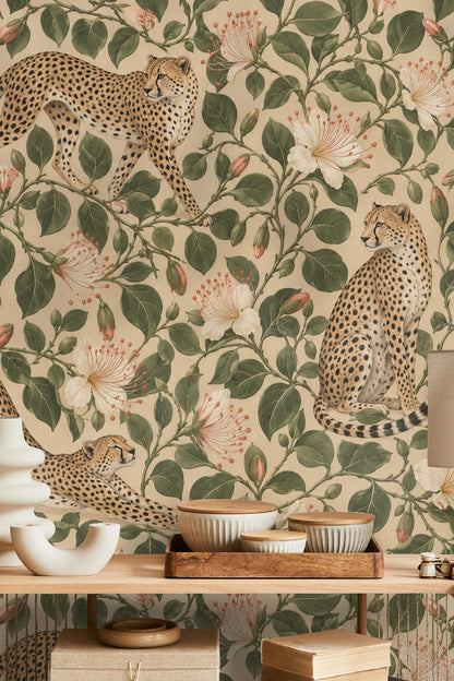 Side view of sitting cheetah integrated with floral vines and buds