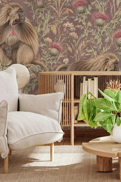 Seated Gelada baboon looking sideways within floral wallpaper pattern.