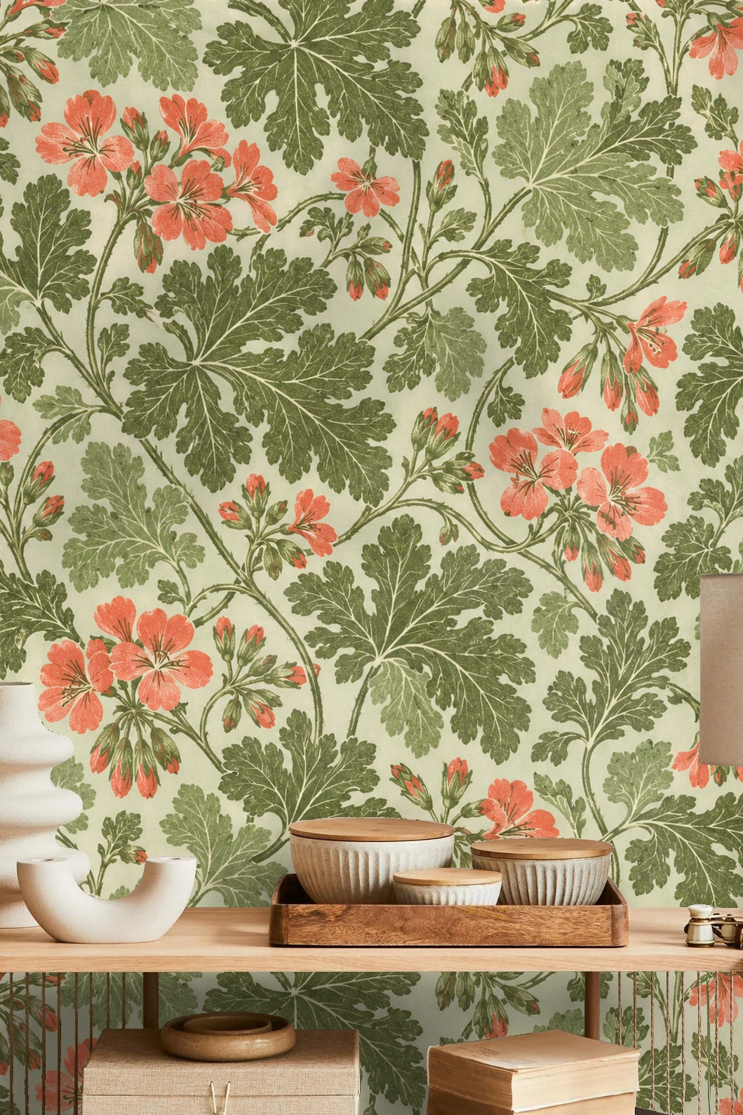 Soft green background supporting dense pelargonium leaves and flowering stems