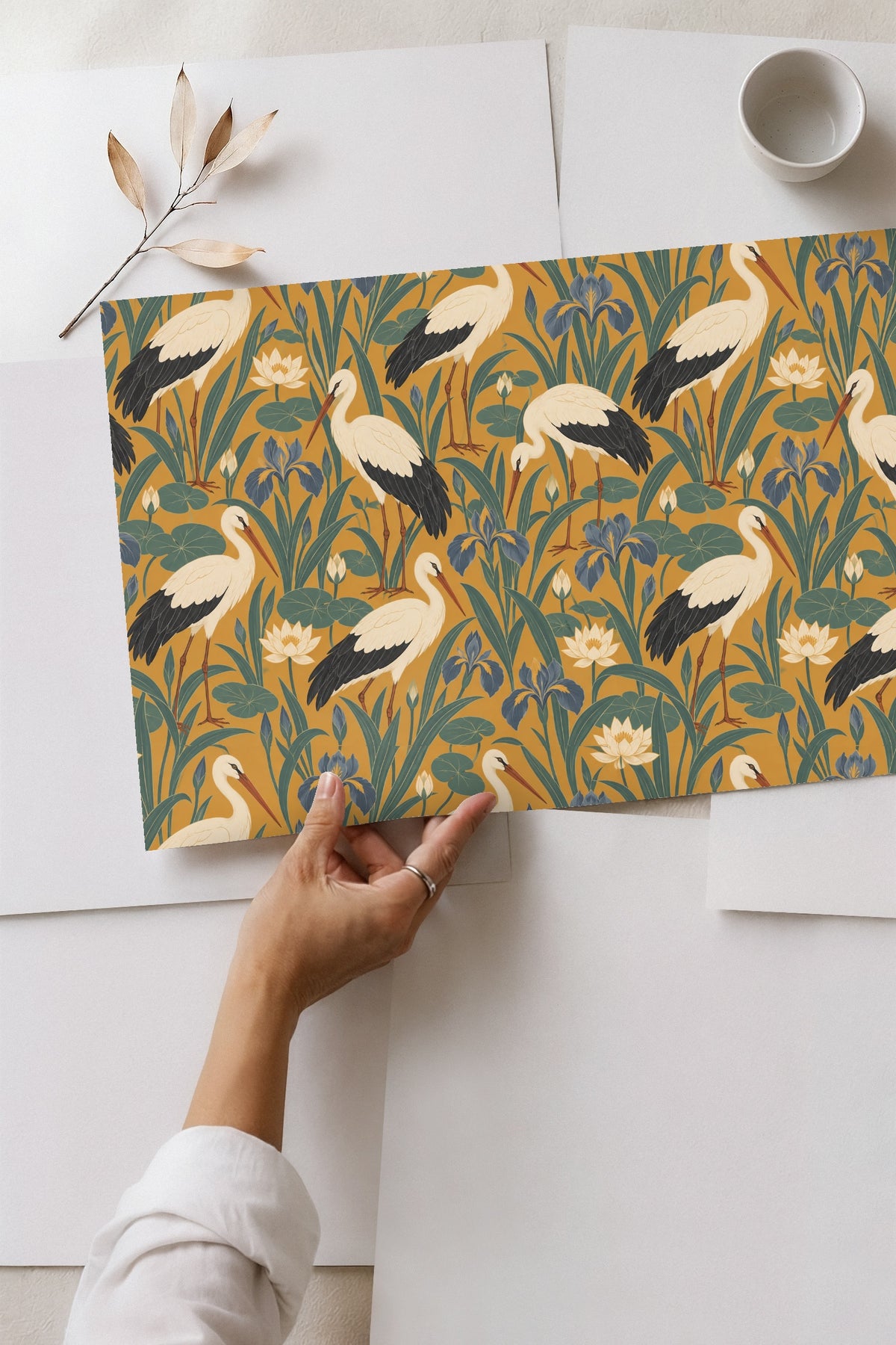 Invitation card graphic with saffron stork themed wallpaper background