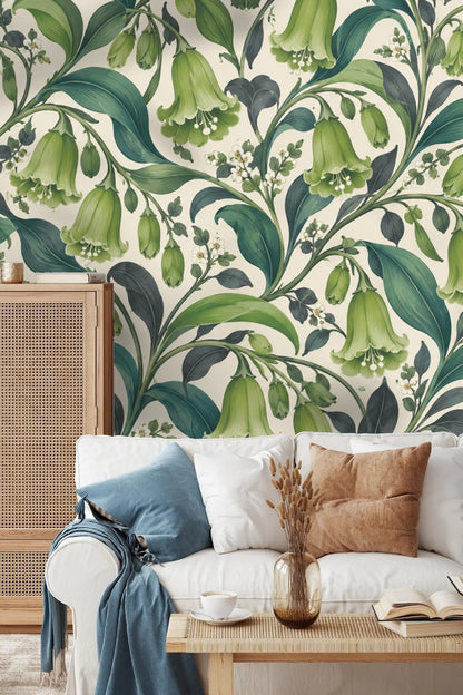 Detailed leaf and flower pattern of botanical wallpaper in soft greens and teal