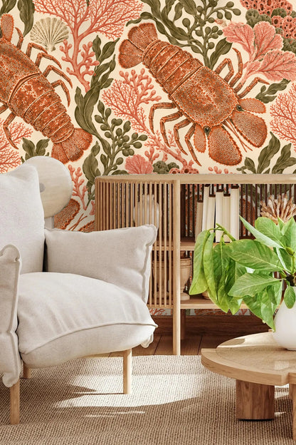 Elegant model room featuring lobster and coral wallpaper paired with vintage hardwood flooring