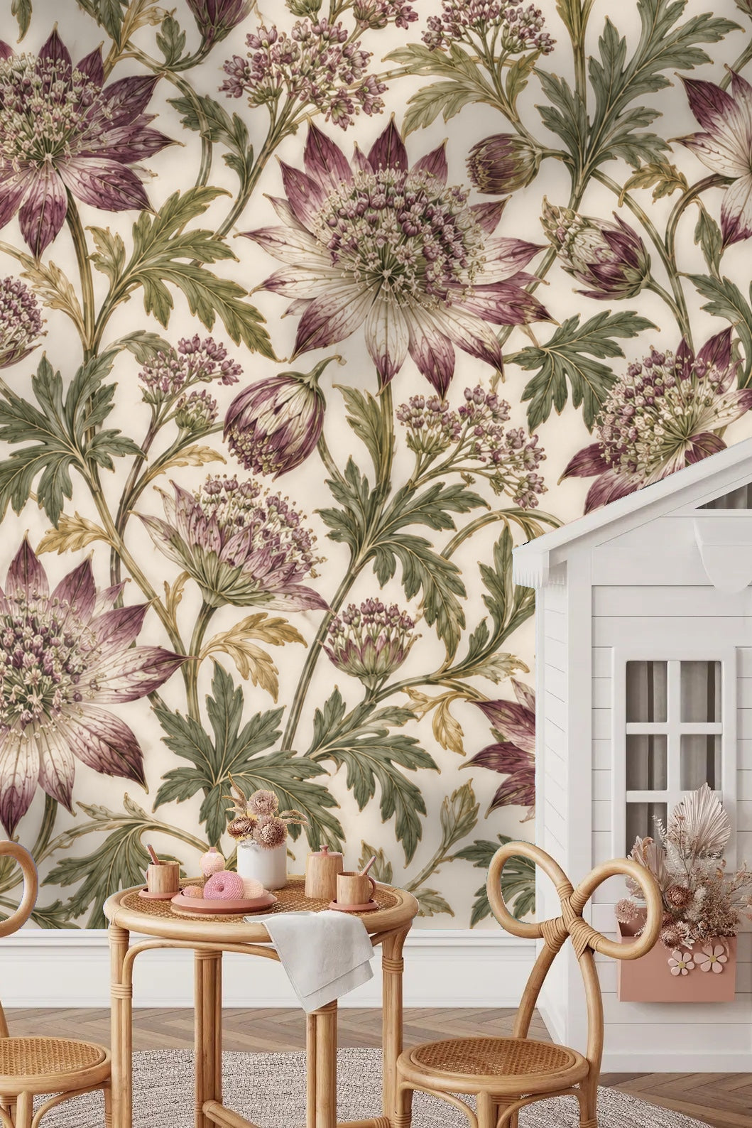 Close-up of astrantia flower and vine botanical wallpaper in plum and green on cream.