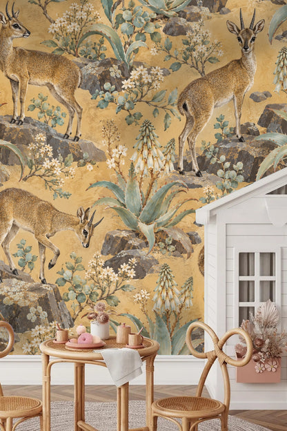 Close-up of klipspringer stoneflower wallpaper shown with vintage wooden chair in sunlight