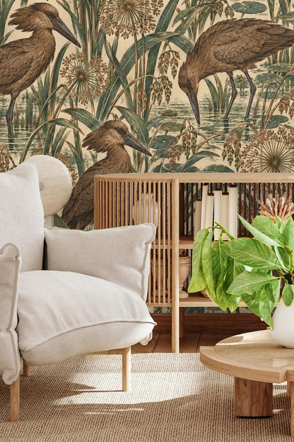 Playroom wall featuring part of the hamerkop reed ramble wallpaper with wicker chairs and a white playhouse