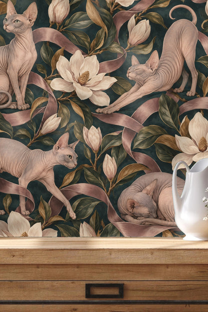 Dark teal wallpaper background visible between floral and feline motifs.