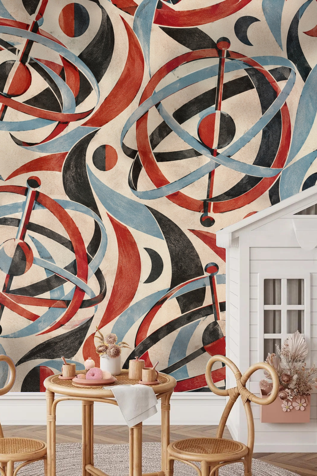 Abstract mural in living room space with Madder Gyroscope Garden wallpaper showing swirling rings and spheres in red, blue, and black