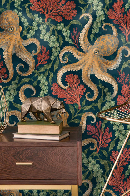 Leather chair with natural light highlighting octopus tide wallpaper with seaweed and coral