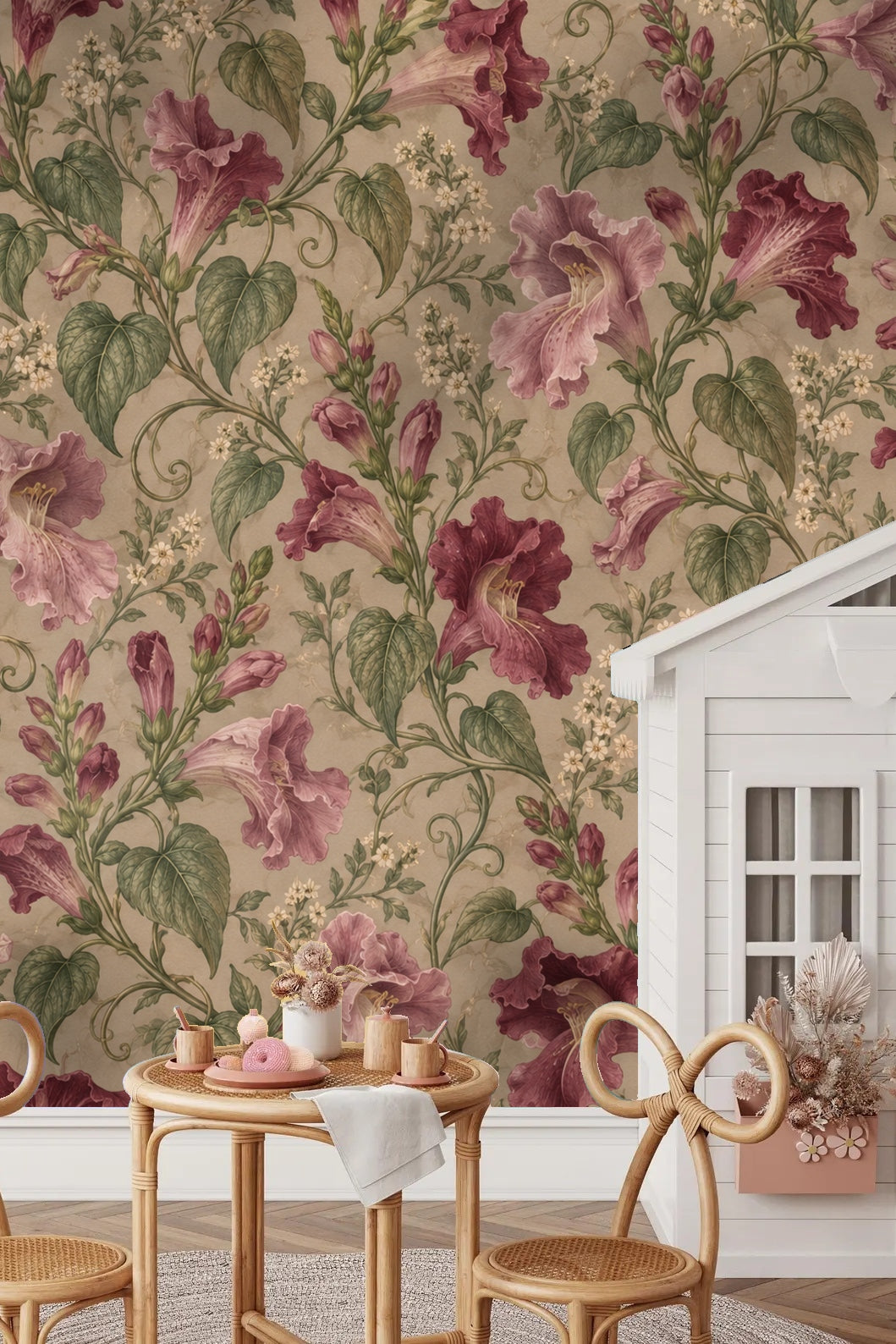 Living room wall covered in Maurandya Rose Scroll wallpaper behind an orange sofa and white coffee table