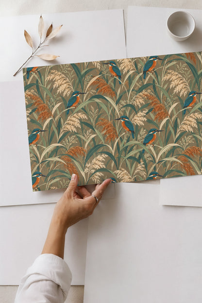 Intricate botanical brushwork of grasses and small reed flower spikes with perched birds across wallpaper.