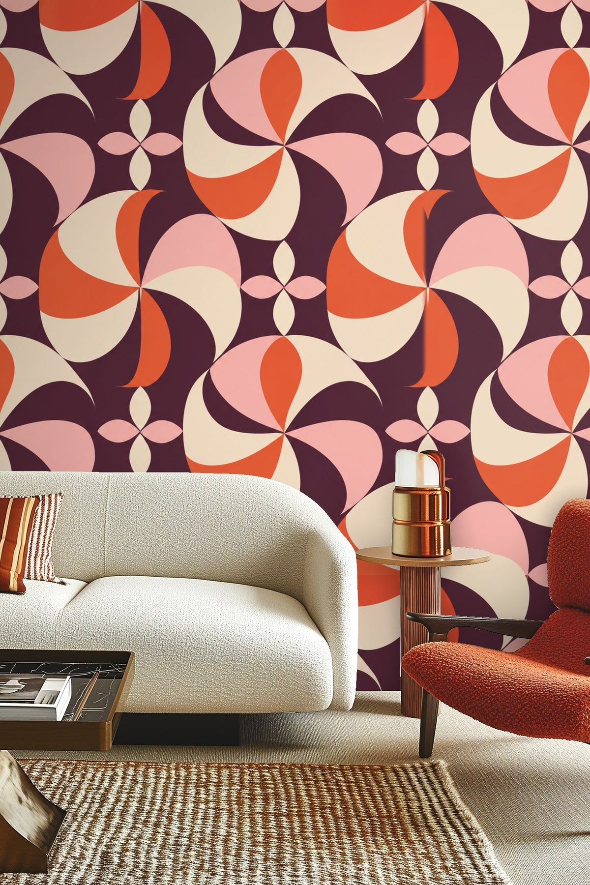 Bedroom wall behind green velvet headboard adorned with Plum Pinwheel wallpaper pattern