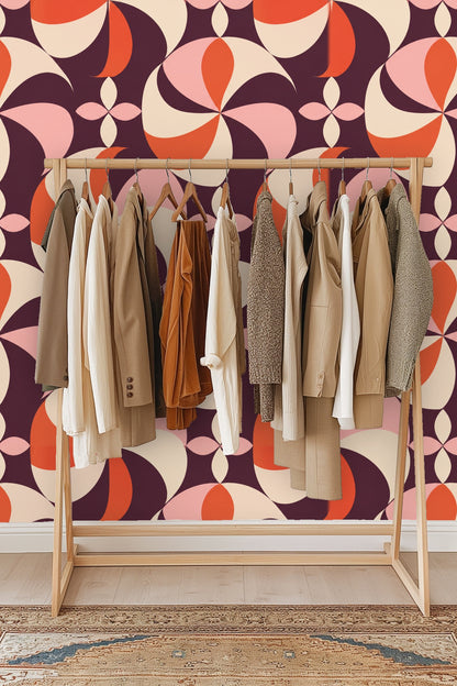 Soft wood bench seating beneath arch with Plum Pinwheel wallpaper accent