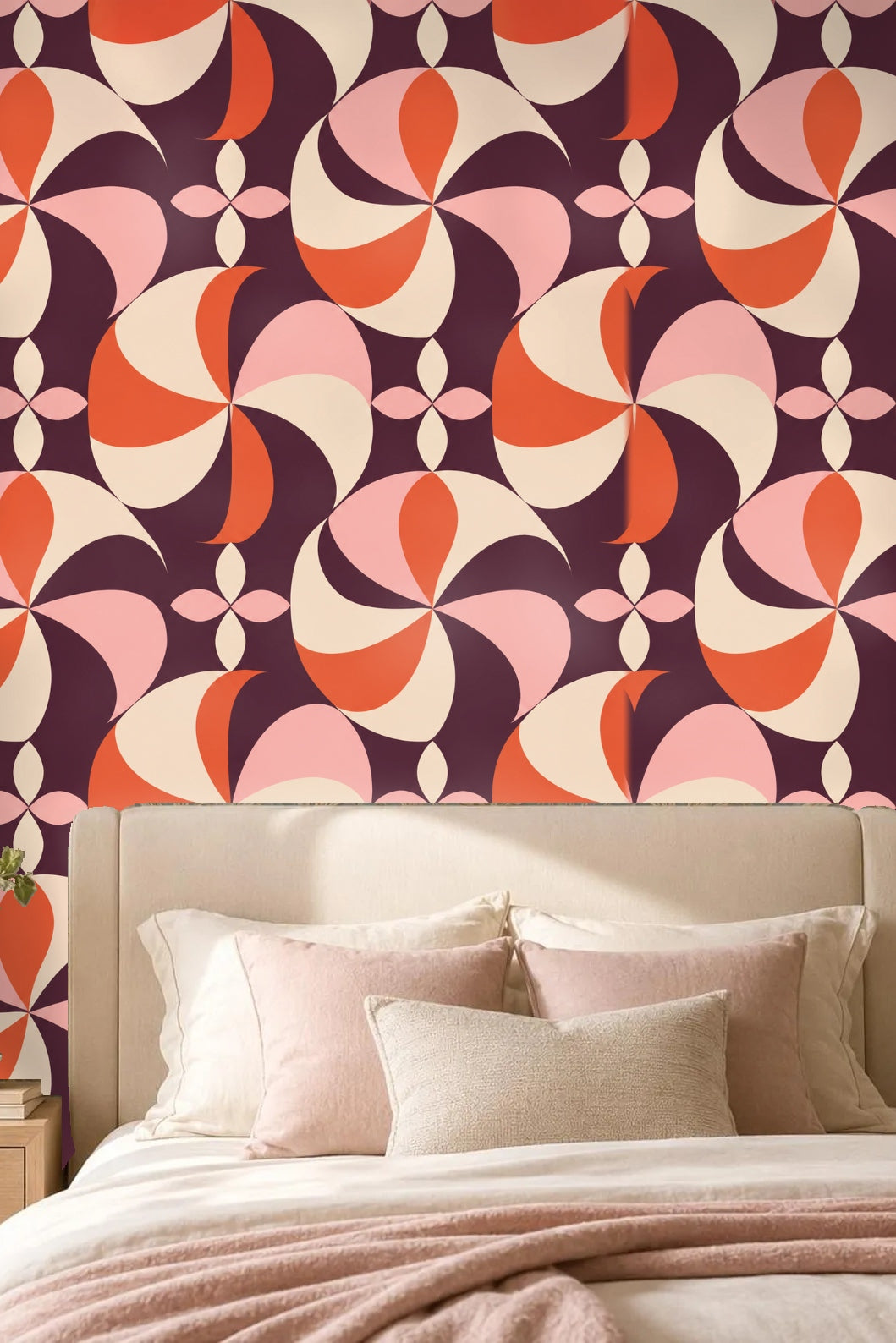 Close up on intersections of pinwheel petals in vibrant plum and coral hues