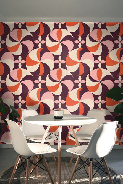 Perspective showing Plum Pinwheel wallpaper's scale relative to furniture