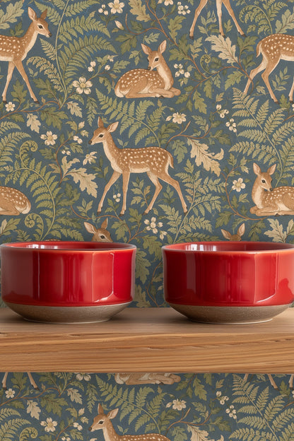 Blue leafy wallpaper layered with brown spotted fawns