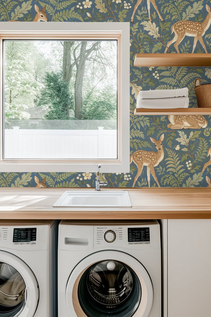Side view of a fawn with spots on wallpaper