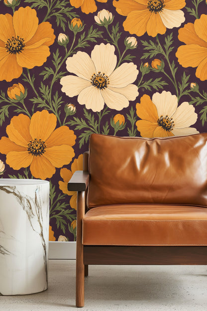 Bedroom with amber and cream cosmos wallpaper mural on a feature wall behind a bed with white bedding and natural wood nightstands