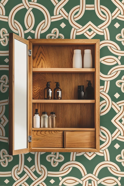 Laundry room wall behind sink and washer/dryer covered in Jade Mooring Knotwork wallpaper in green and ivory