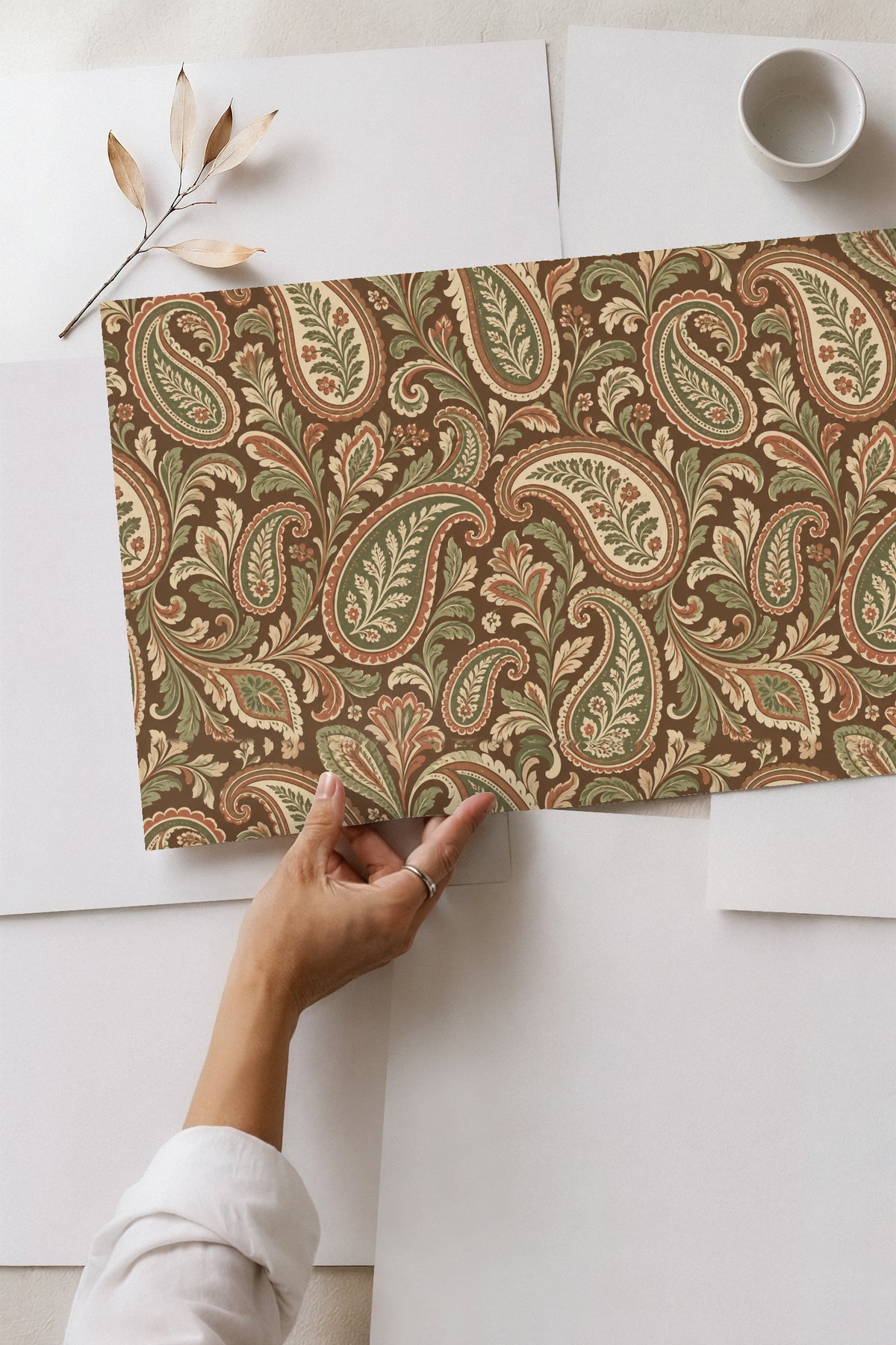 Earth Toned Paisley Scrolls wallpaper shown in an interior setting