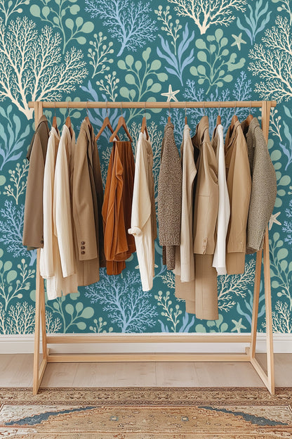 Small starfish motifs on a dark blue-green wallpaper