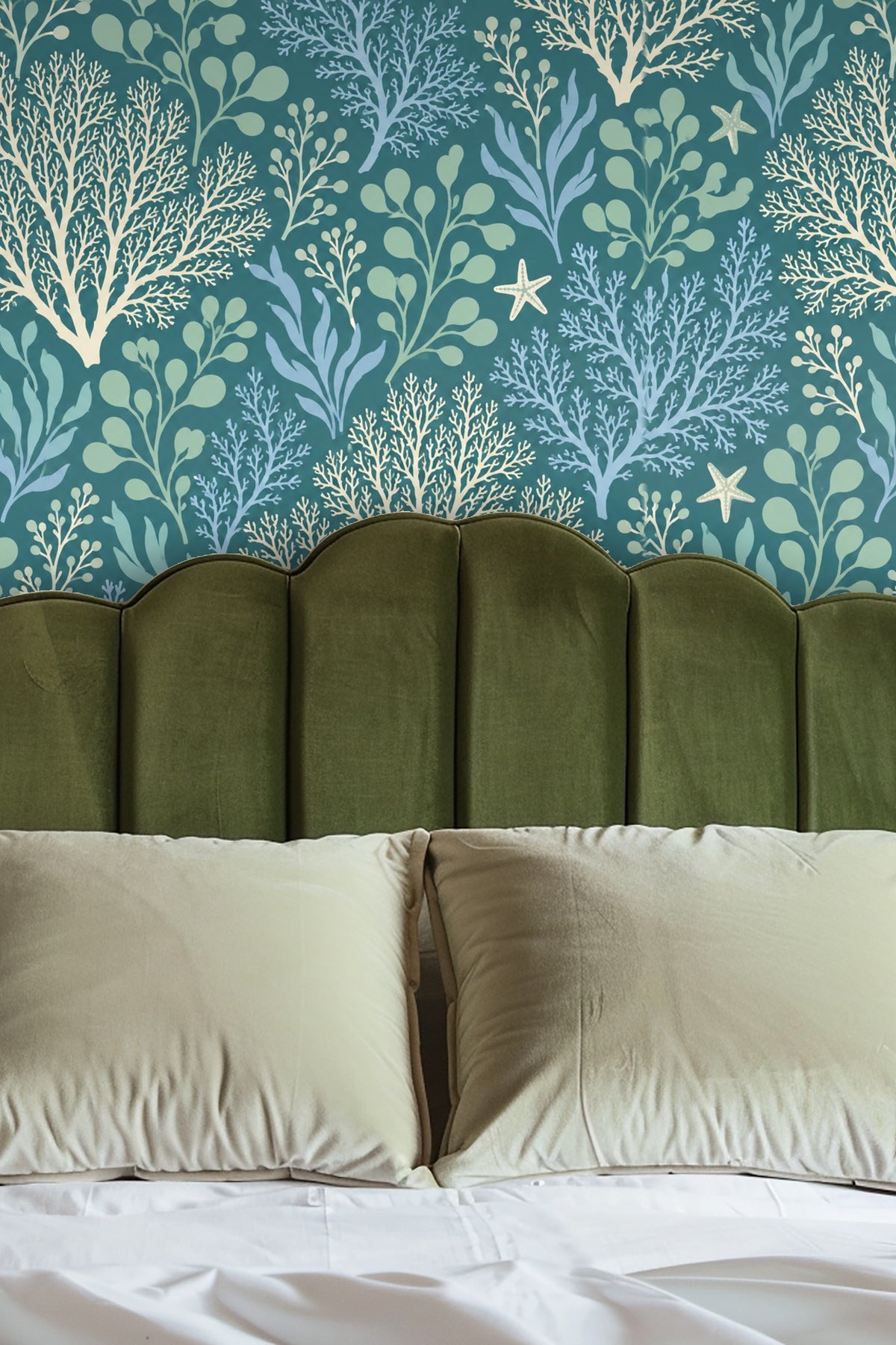 Living room with tan sofa against wallpaper of coral and seaweed in blue and green shades