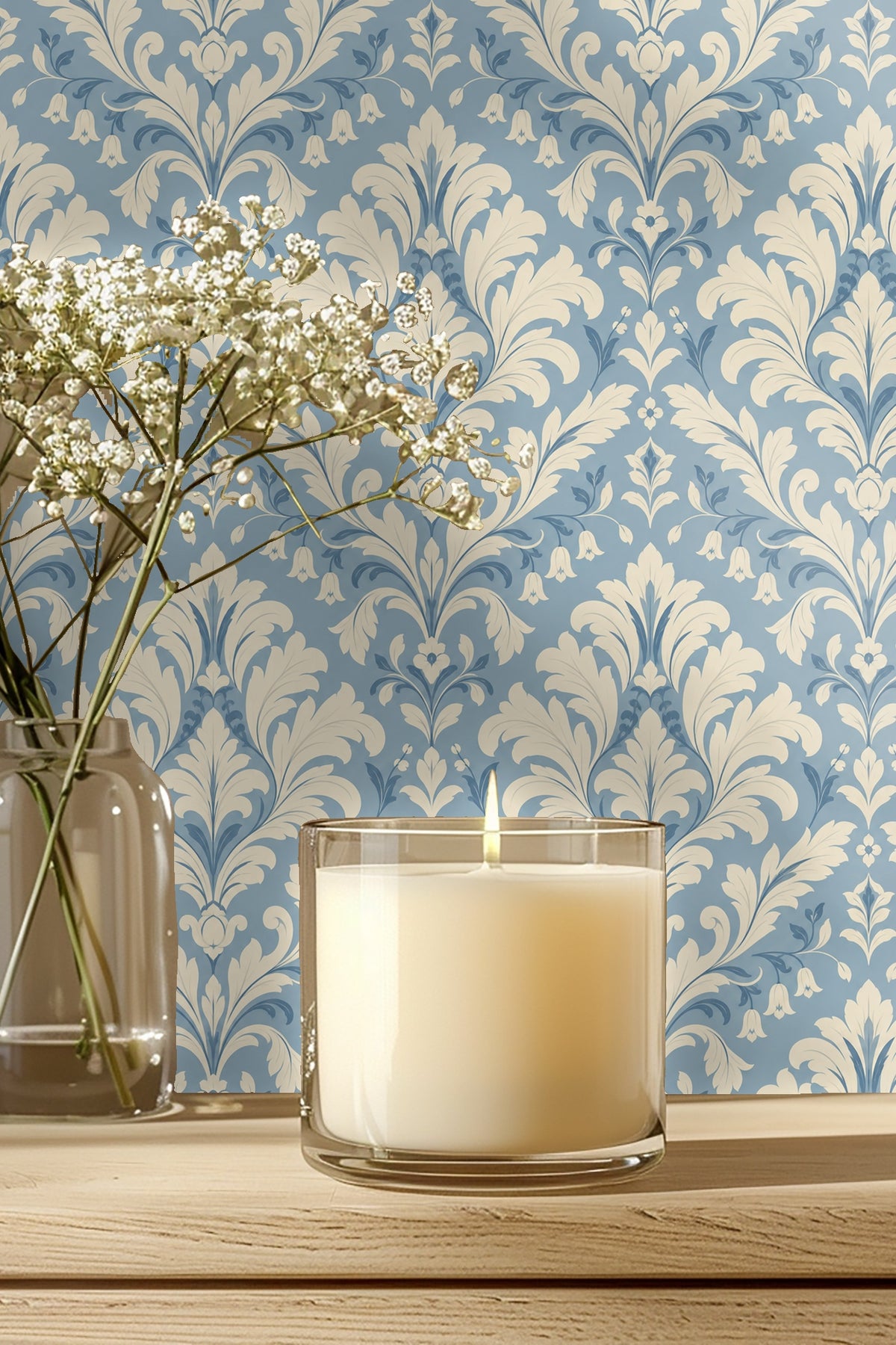 Entryway wall decorated with moss agate damask wallpaper under a round mirror and wood bench.