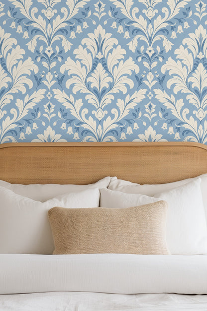 Decorative floral damask wallpaper enhancing a cozy seating niche.
