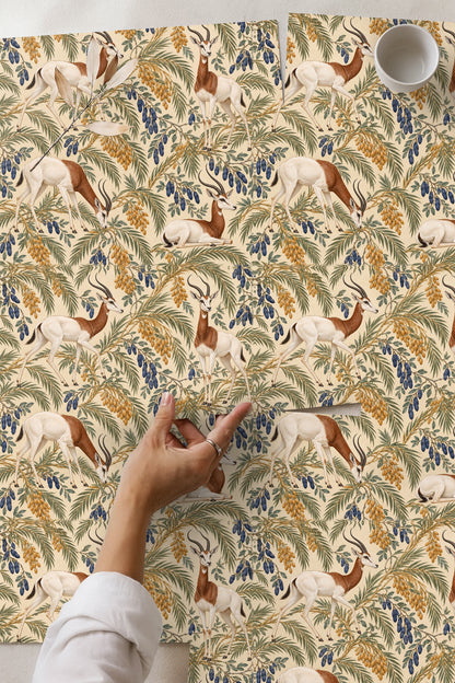 Bedroom with round mirror reflecting Dama Gazelle Datebraid wallpaper behind bed with textured linens.