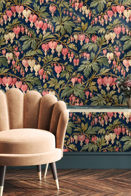 Wallpaper featuring coral and cream dicentra flowers with green leaves on navy background
